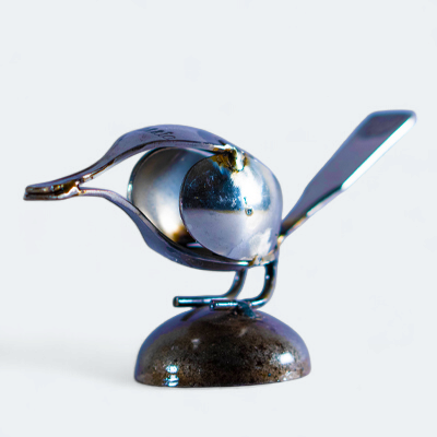 Bent Spoon Bird Inspired Recycled Metal Sculpture With Round base