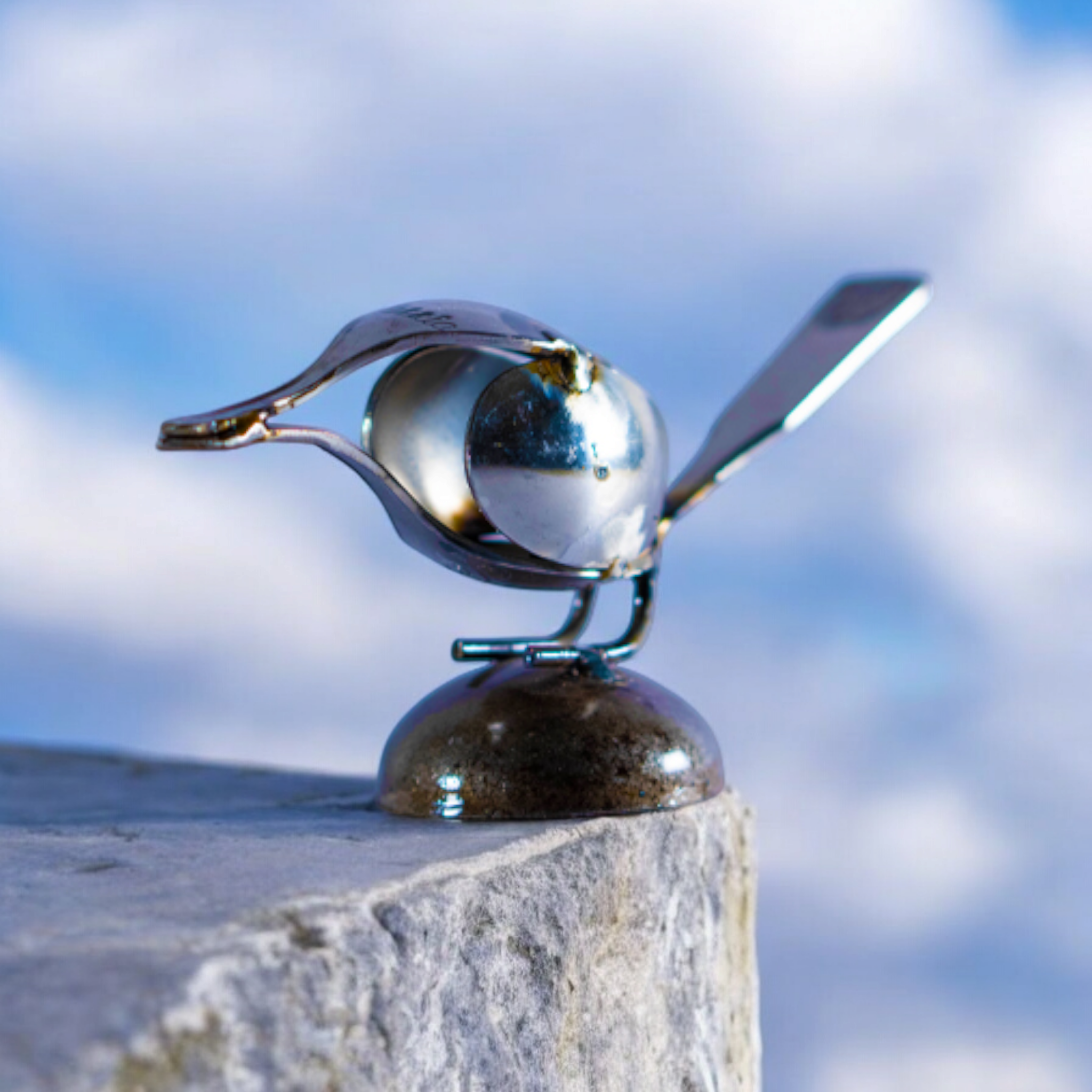 Bent Spoon Bird Inspired Recycled Metal Sculpture With Round base